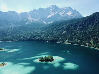 The Eibsee is surrounded by mountains. We have also written a more detailed article about Eibsee Camping.