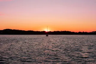 Sunset over the sea in front of the island of Porquerolles near France. For Caribbean beach Europe you are right here.